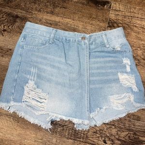 High waisted, distressed shorts